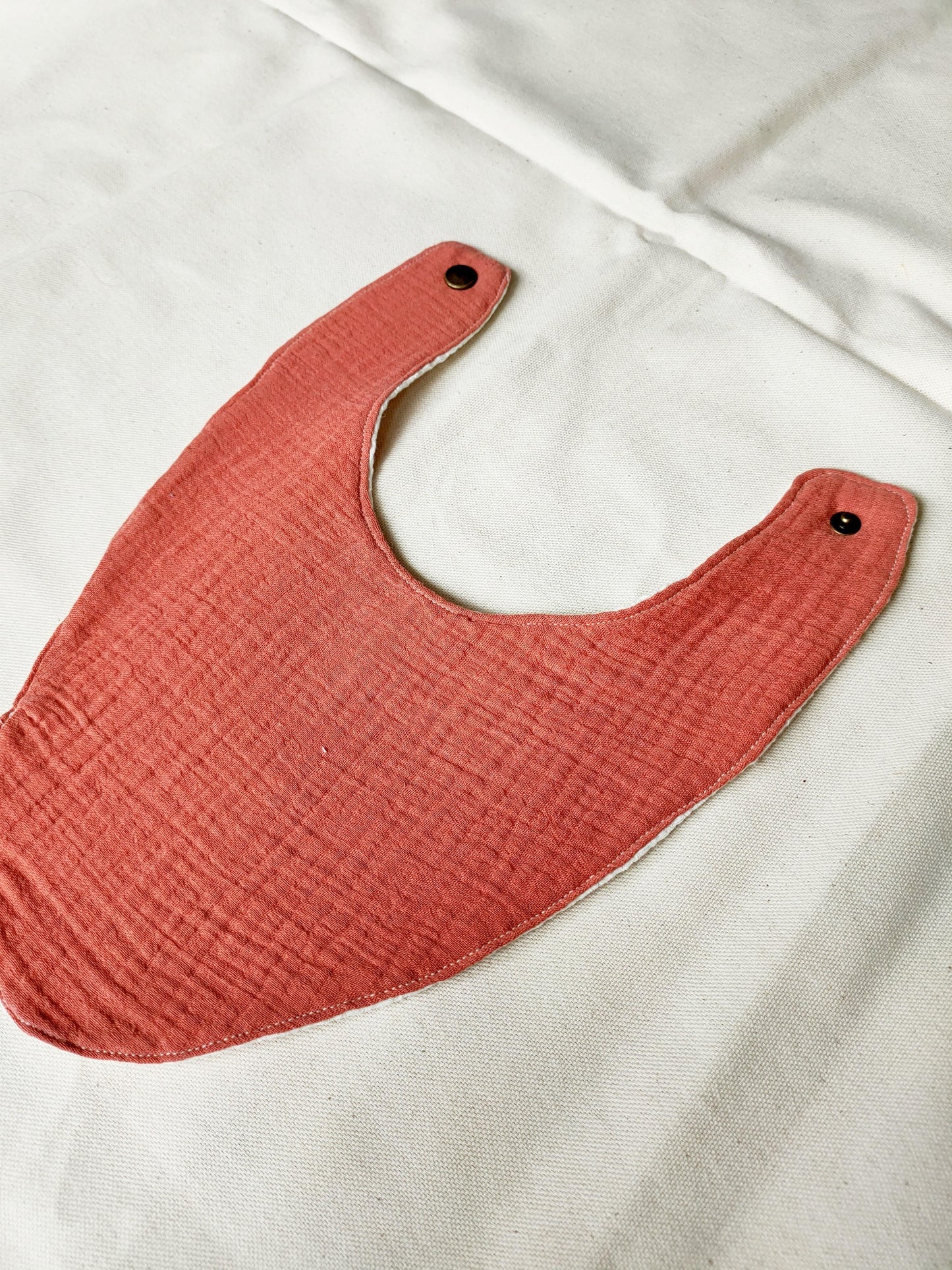 Bavoir Terracotta